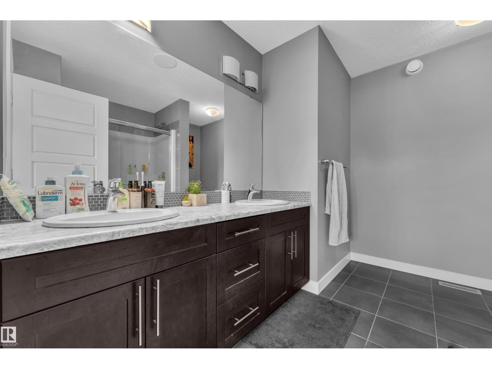 2315 70 ST SW SW - 28