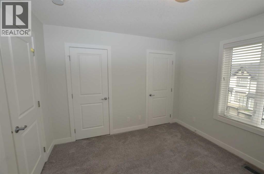 #106 16 Evanscrest Park NW - 32