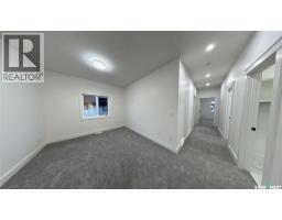 Laundry room - 443 Yuel Crescent, Saskatoon, SK S7W1N6 Photo 8