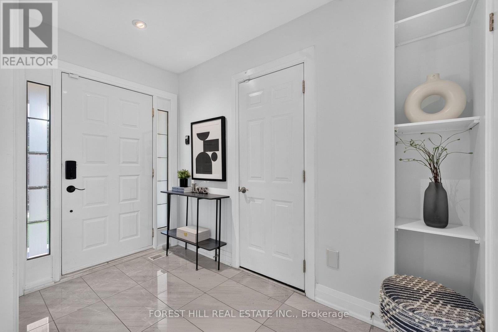Large Foyer W/ Direct Access To Garage
