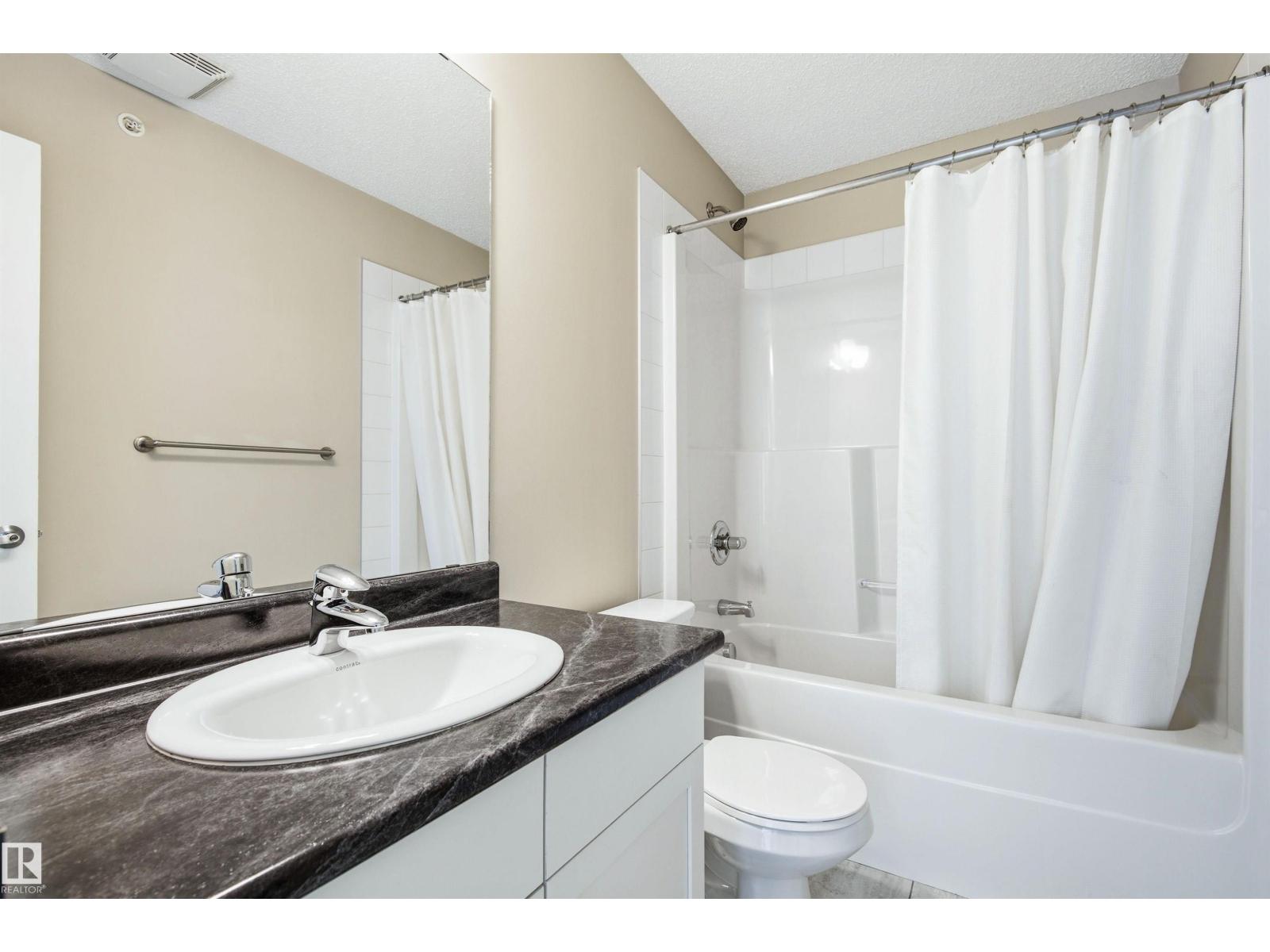 #435 5515 7 AV SW - 27