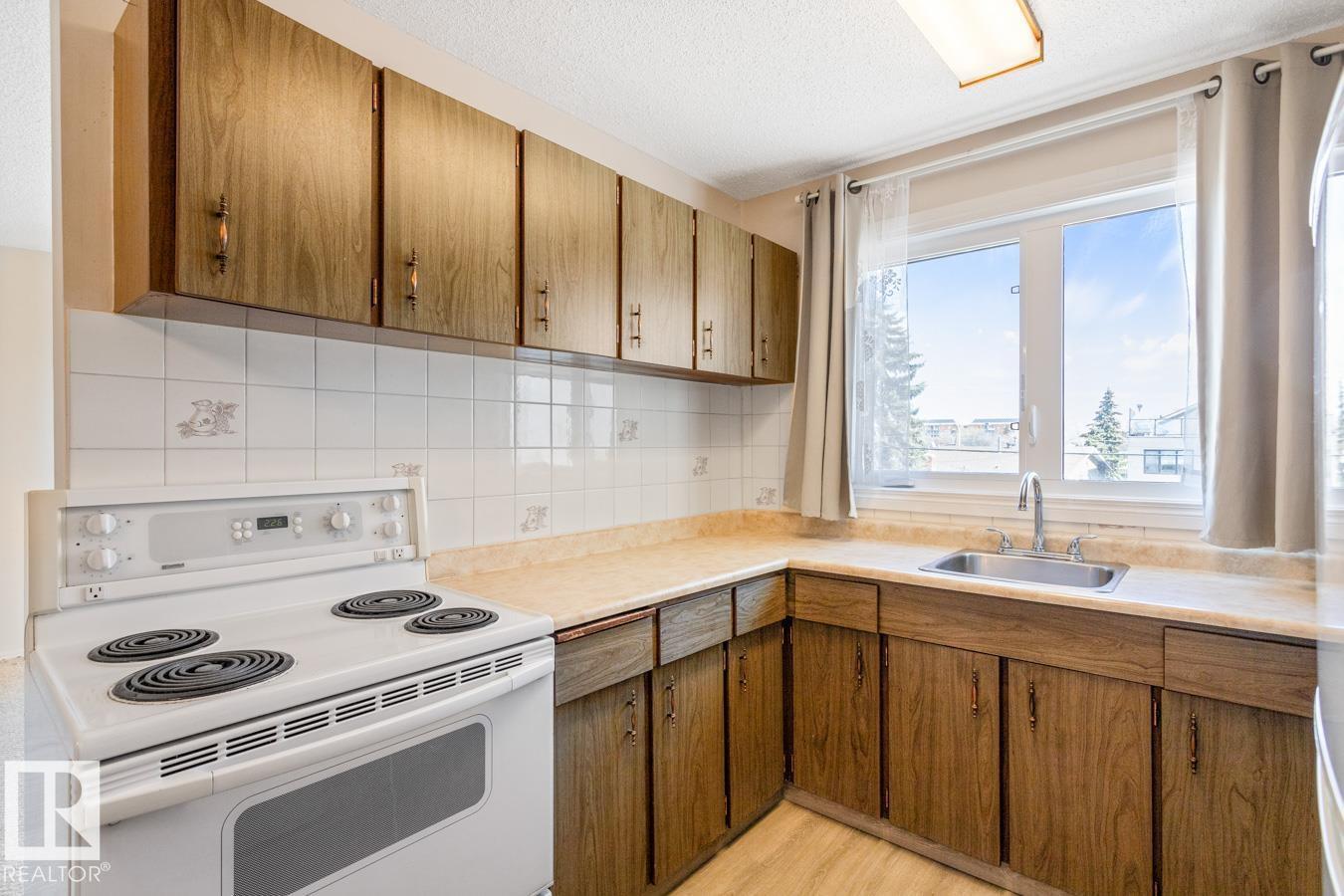 #302 11045 132 ST NW - 13