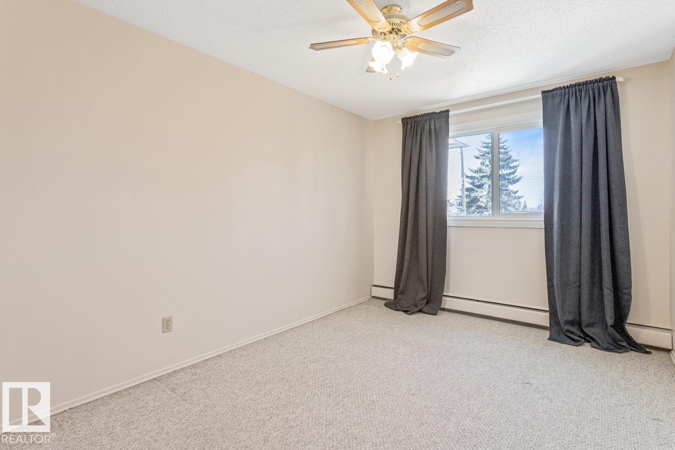 #302 11045 132 ST NW - 14