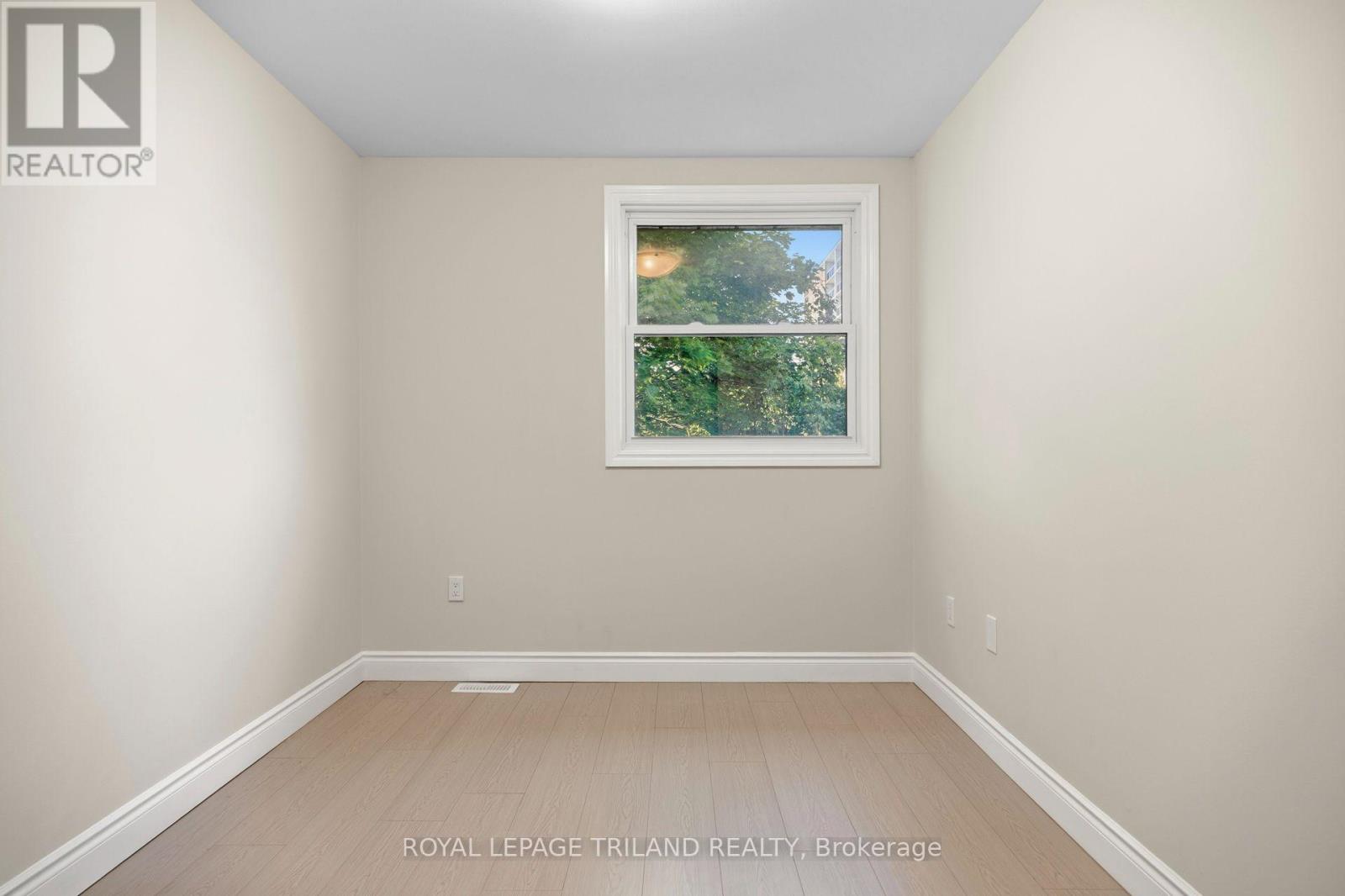 #8 710 WONDERLAND ROAD S - 21