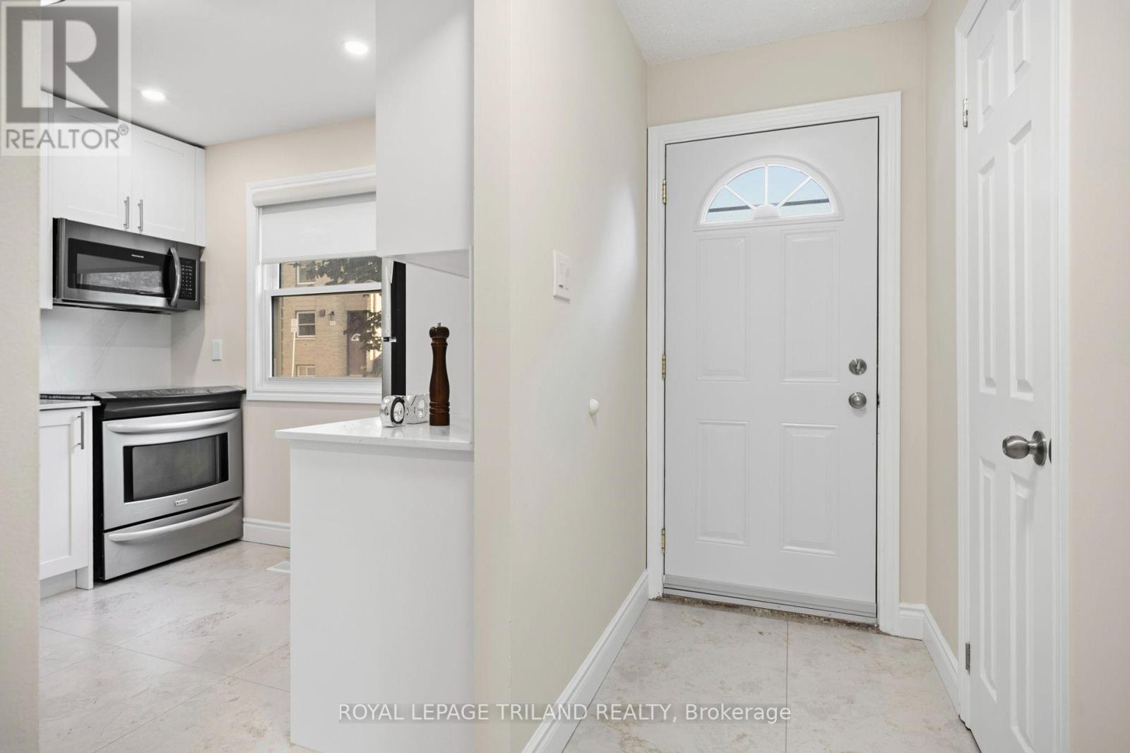 #8 710 WONDERLAND ROAD S - 5