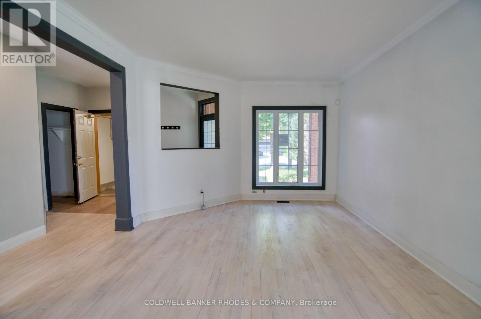 Living room with front windows street view