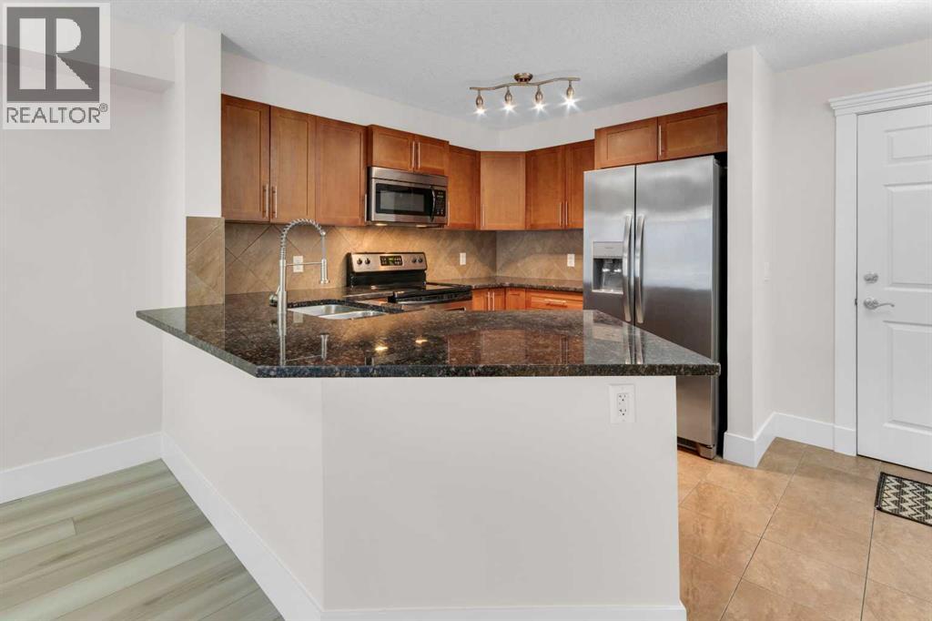#102 500 Rocky Vista Gardens NW - 7