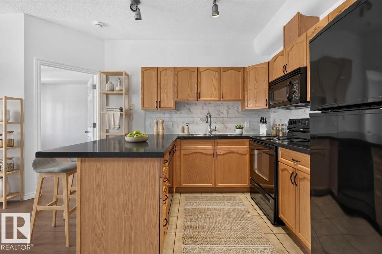 #209 10235 112 ST NW - 6