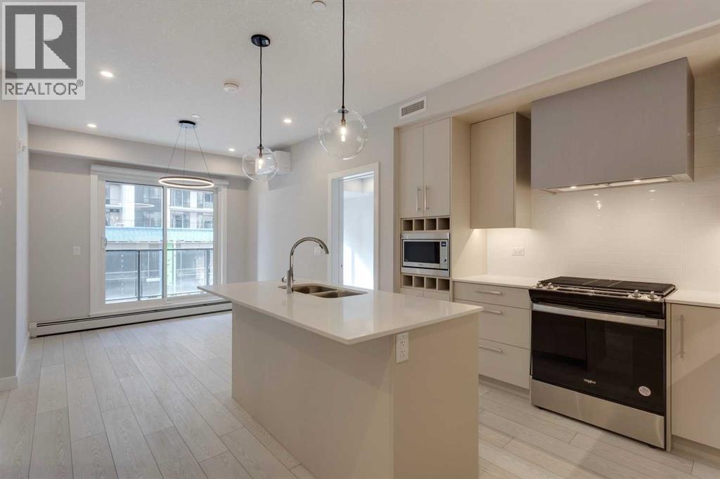 #206 8370 Broadcast Avenue SW - 1