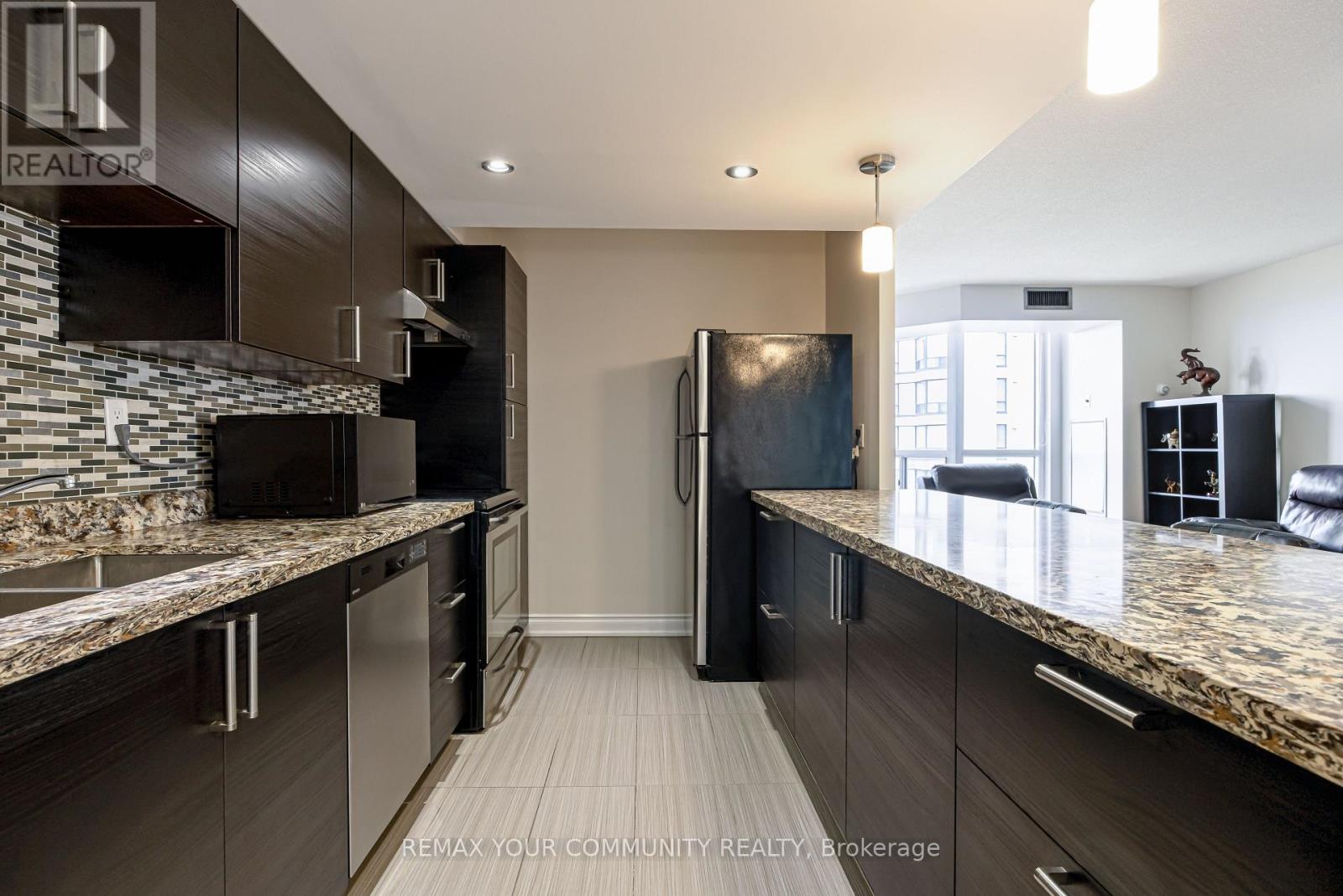 #910 4460 TUCANA COURT - Image 6