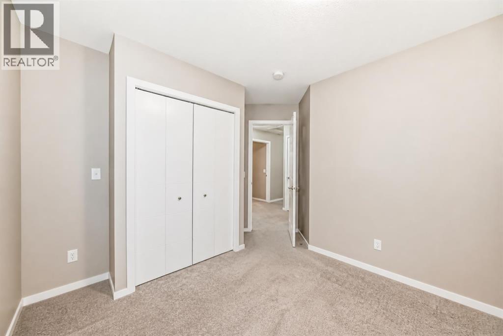 #202 245 Redstone Walk NE - 17