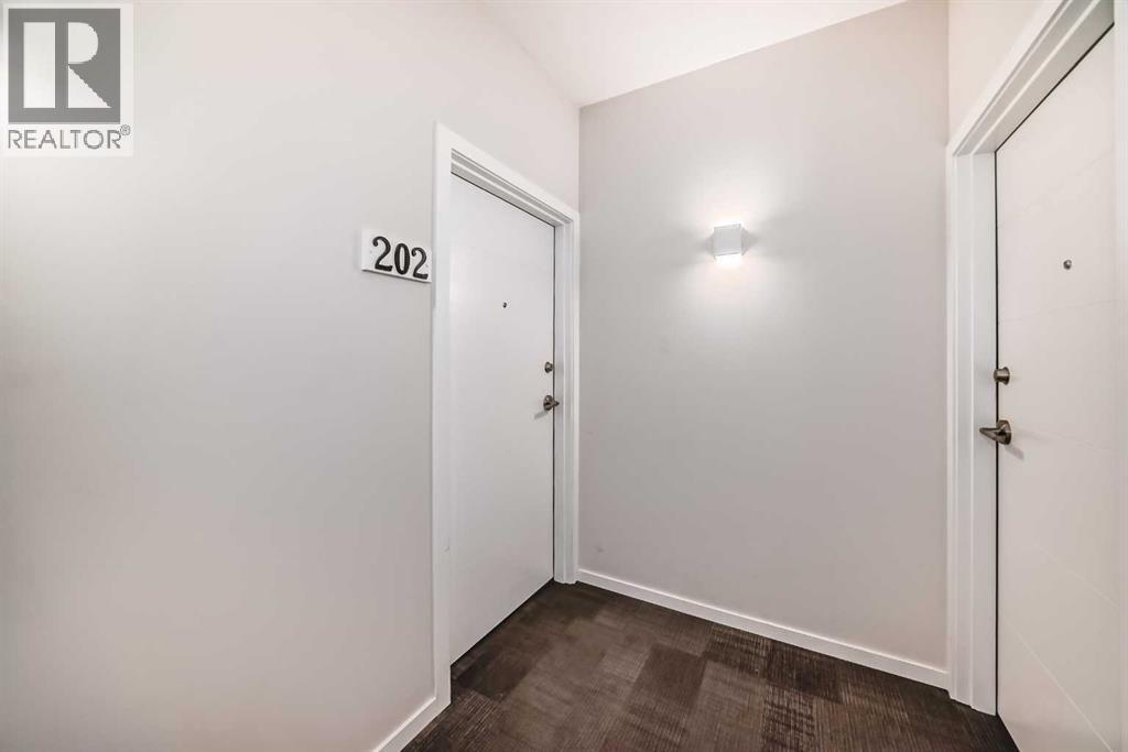 #202 245 Redstone Walk NE - 3