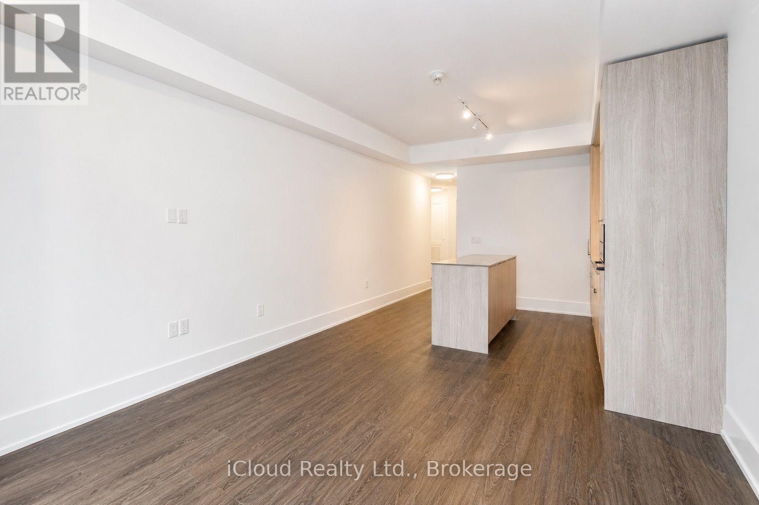 #303 123 PORTLAND STREET - 6