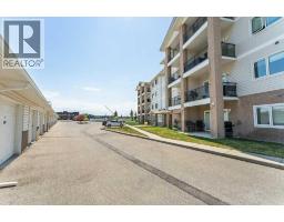 303, 300 Edwards Way Nw, Airdrie, AB T4B3B4 Photo 23