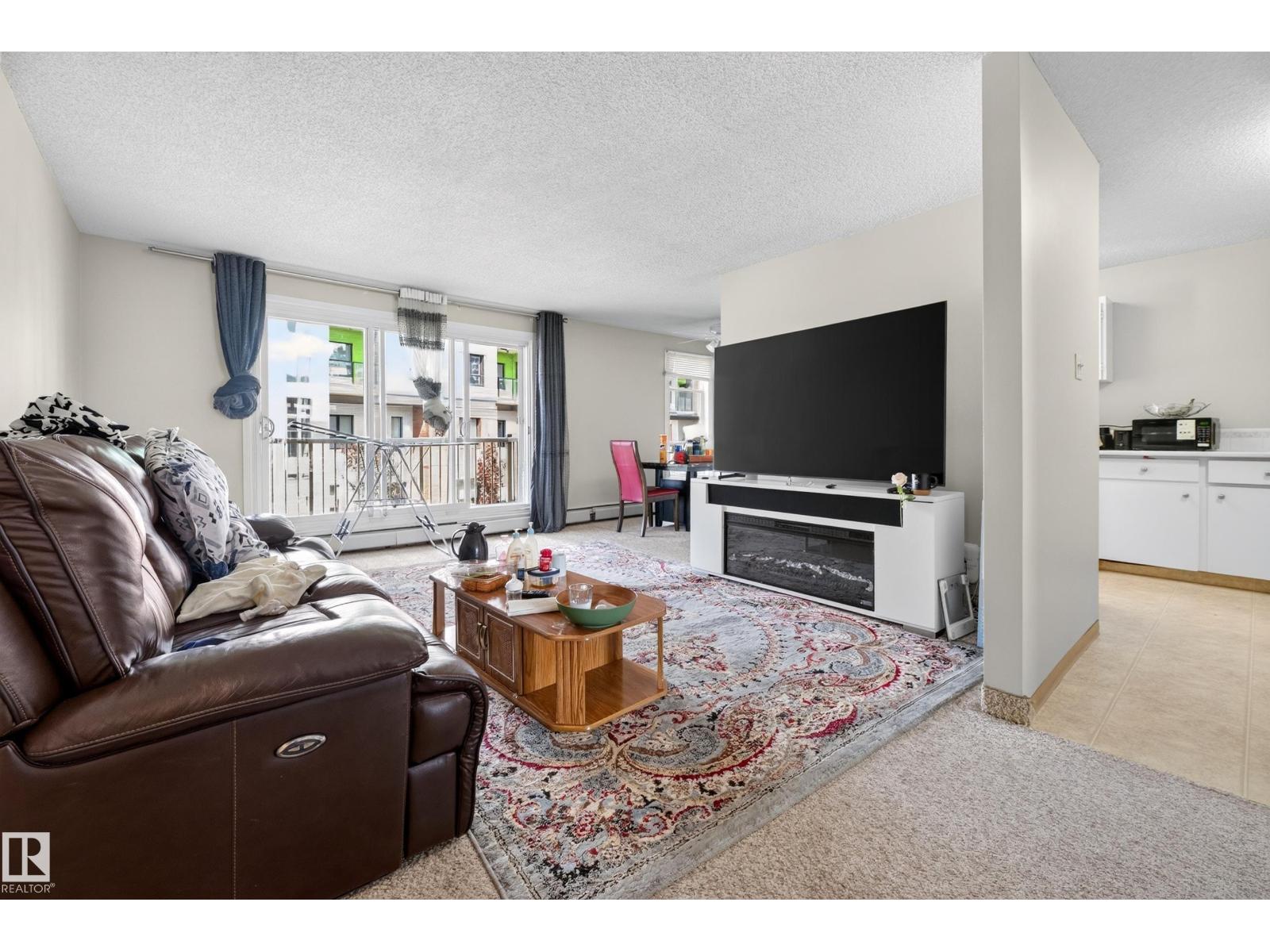 #209 7220 144 AV NW - 10