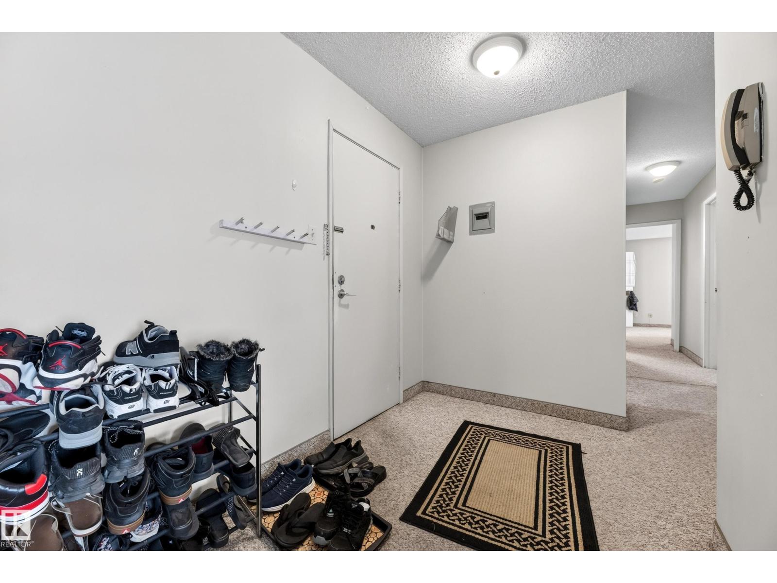 #209 7220 144 AV NW - 8
