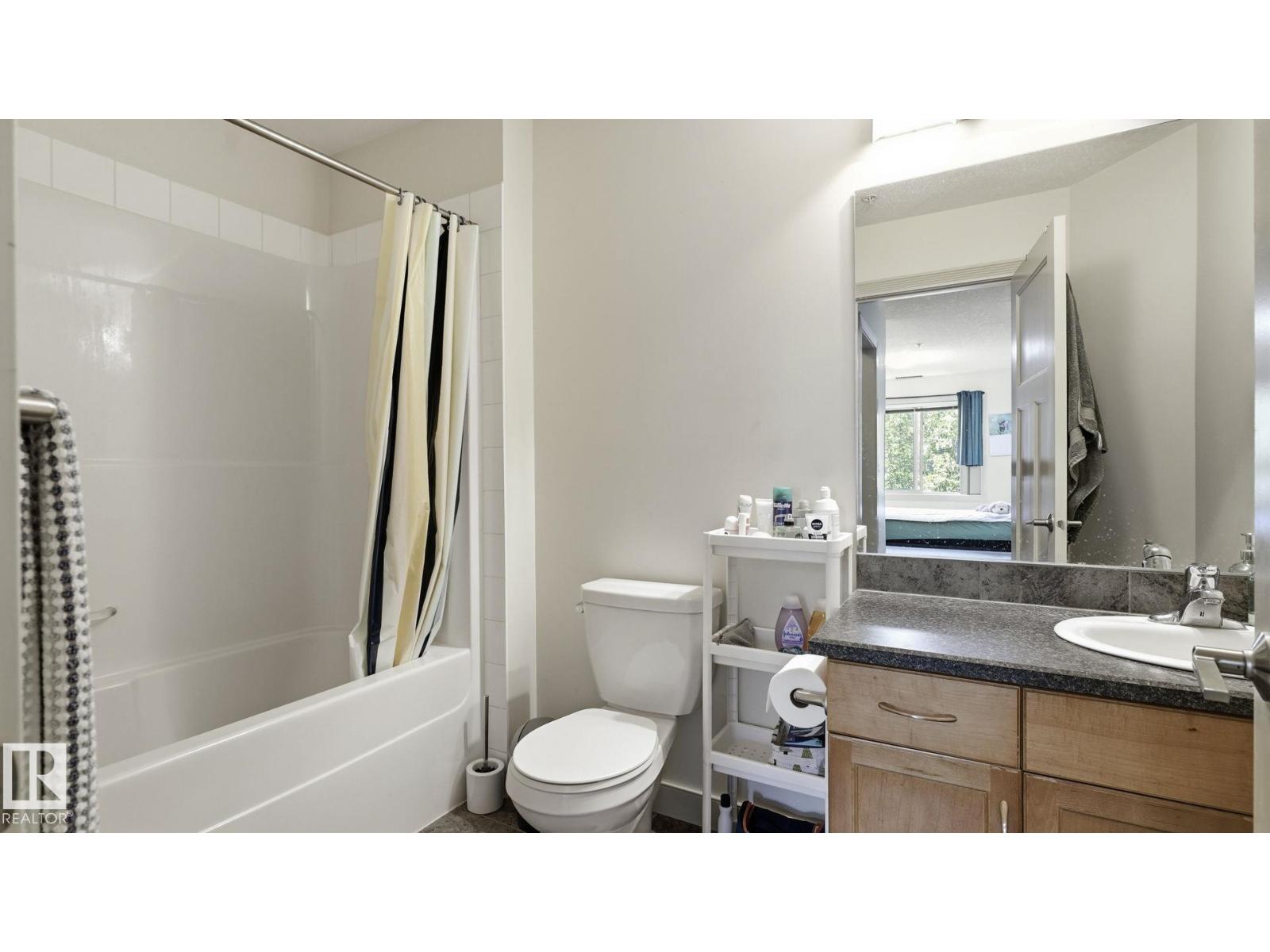 #303 16235 51 ST NW NW - 14