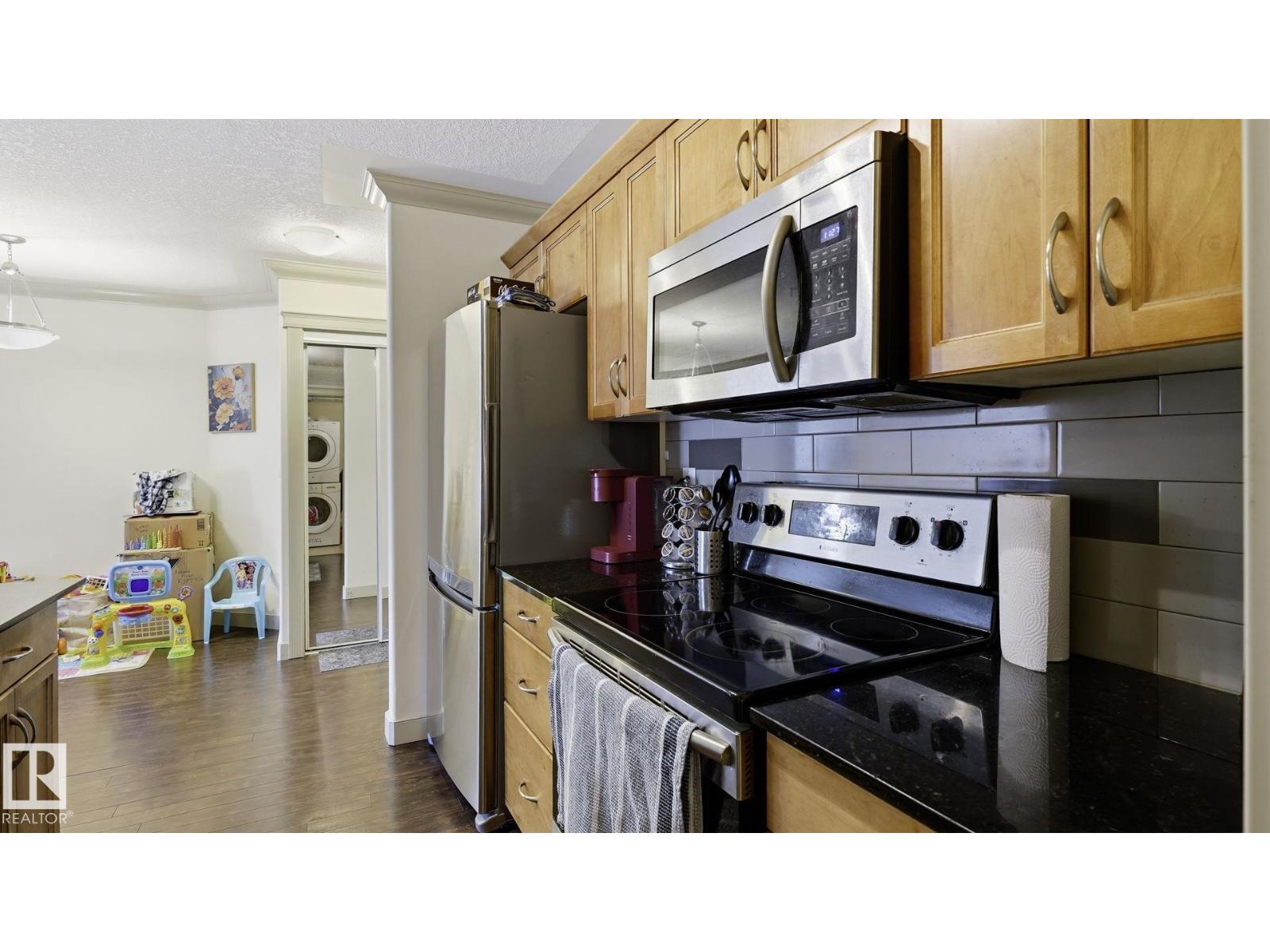 #303 16235 51 ST NW NW - 7