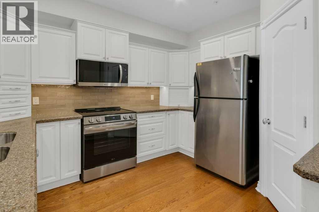 #1107 151 Country Village Road NE - Image 7