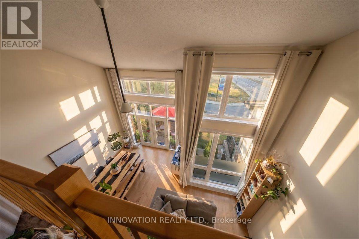 Expansive windows create bright, sun-filled spaces