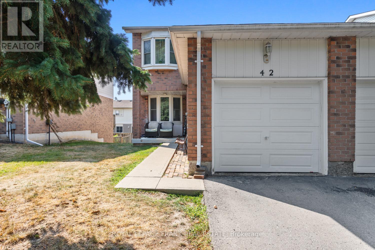 #42 700 HARMONY ROAD N - 1
