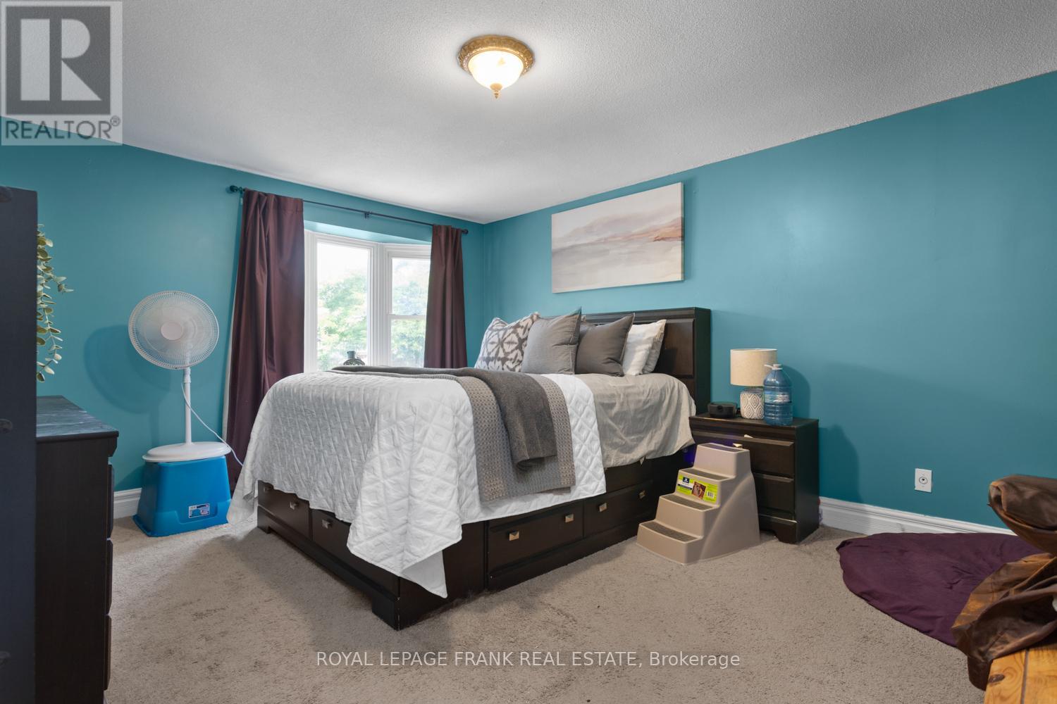 #42 700 HARMONY ROAD N - 12