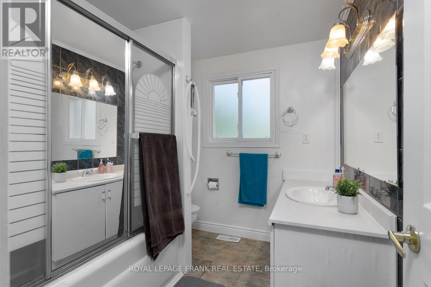#42 700 HARMONY ROAD N - 23