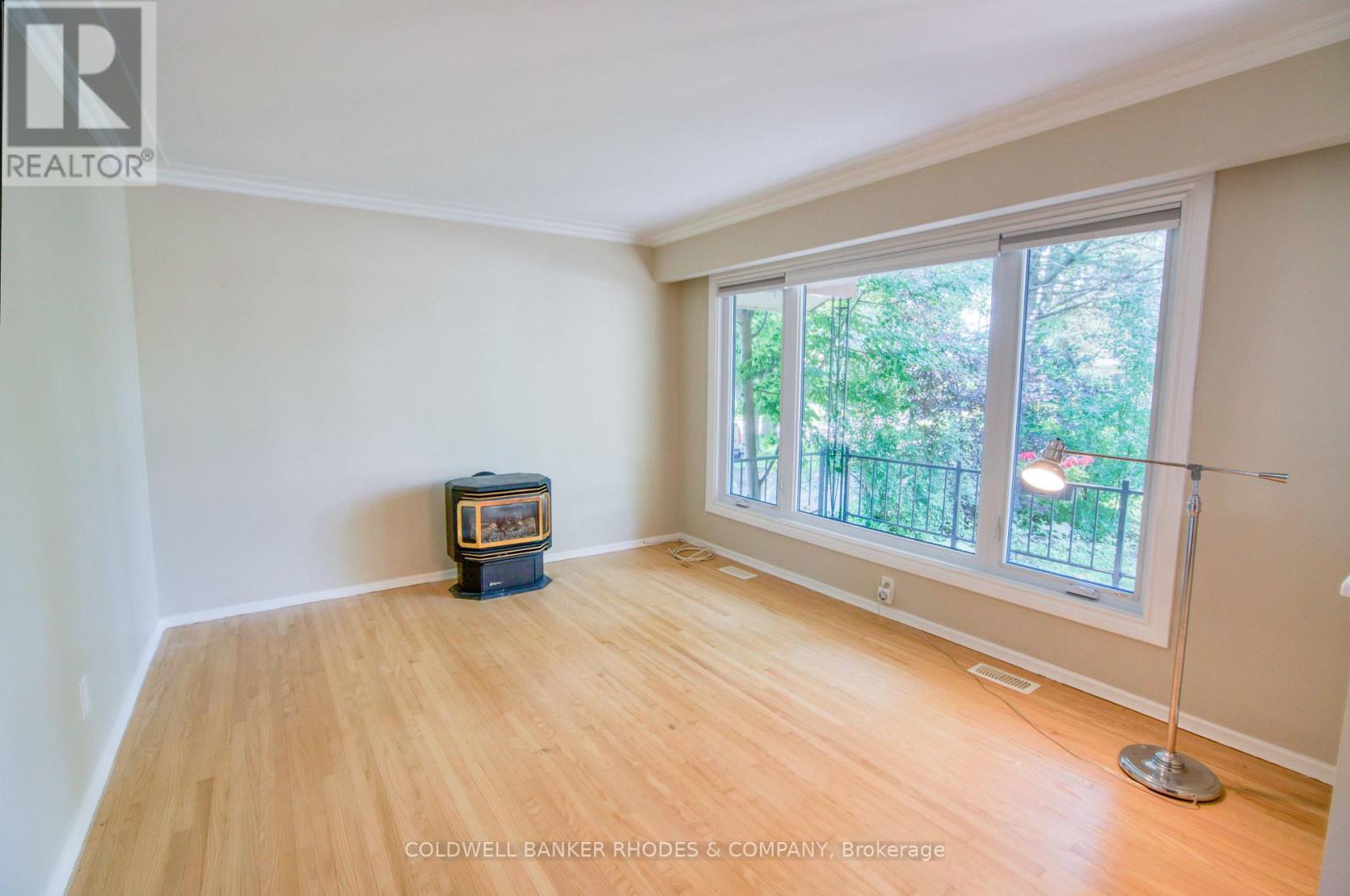 Spacious living room with decorative fireplace