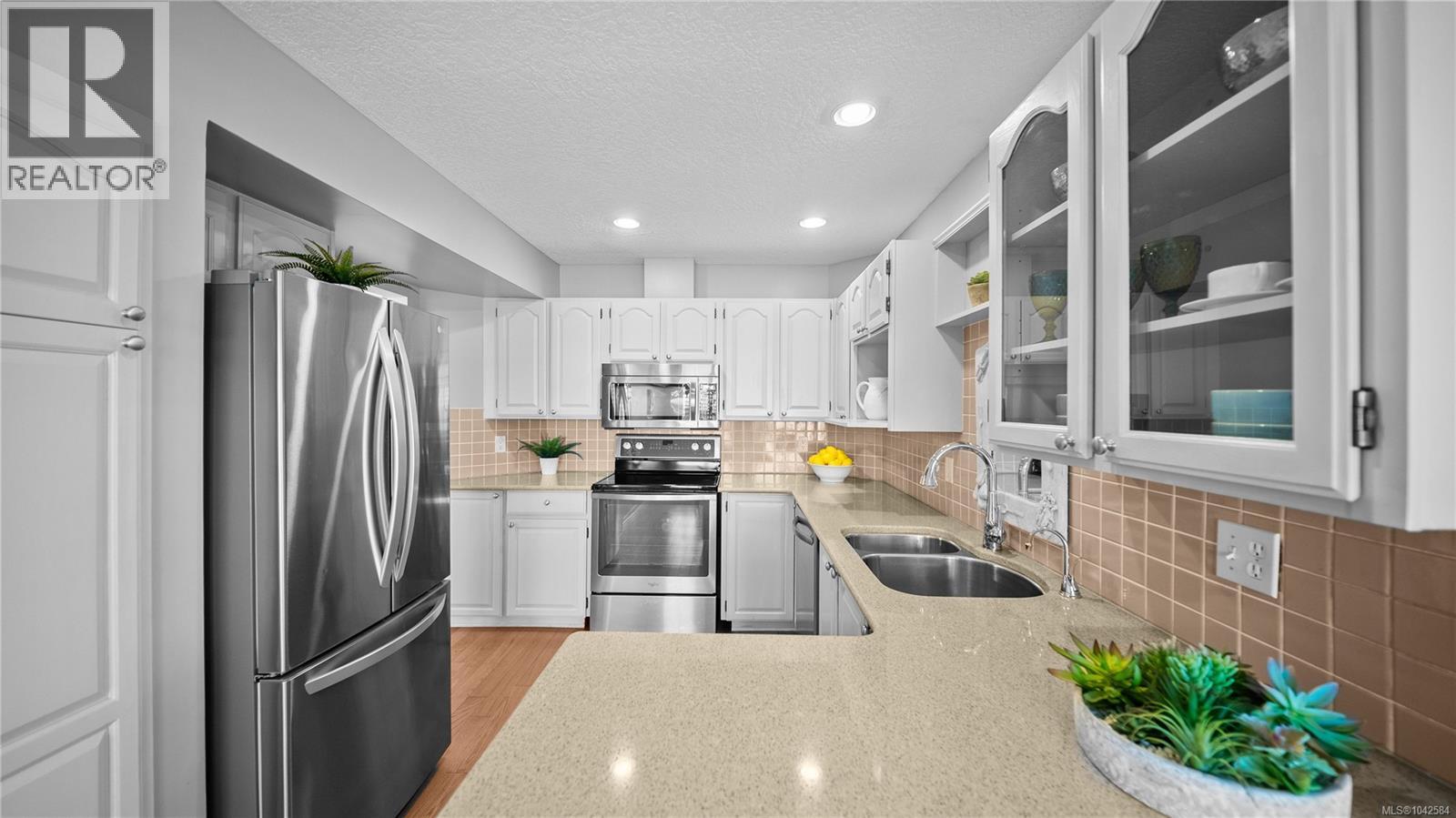 #304 6880 Wallace Dr - 22