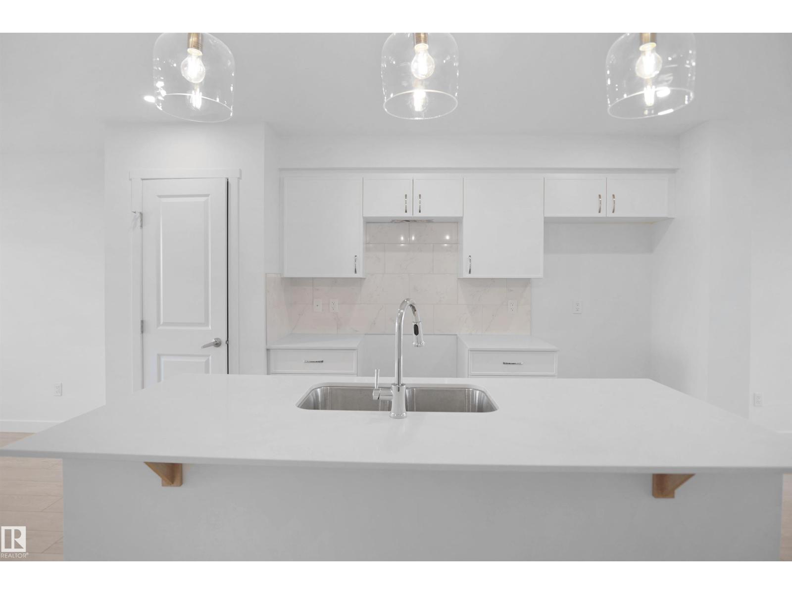 21035 25 AV NW - 10