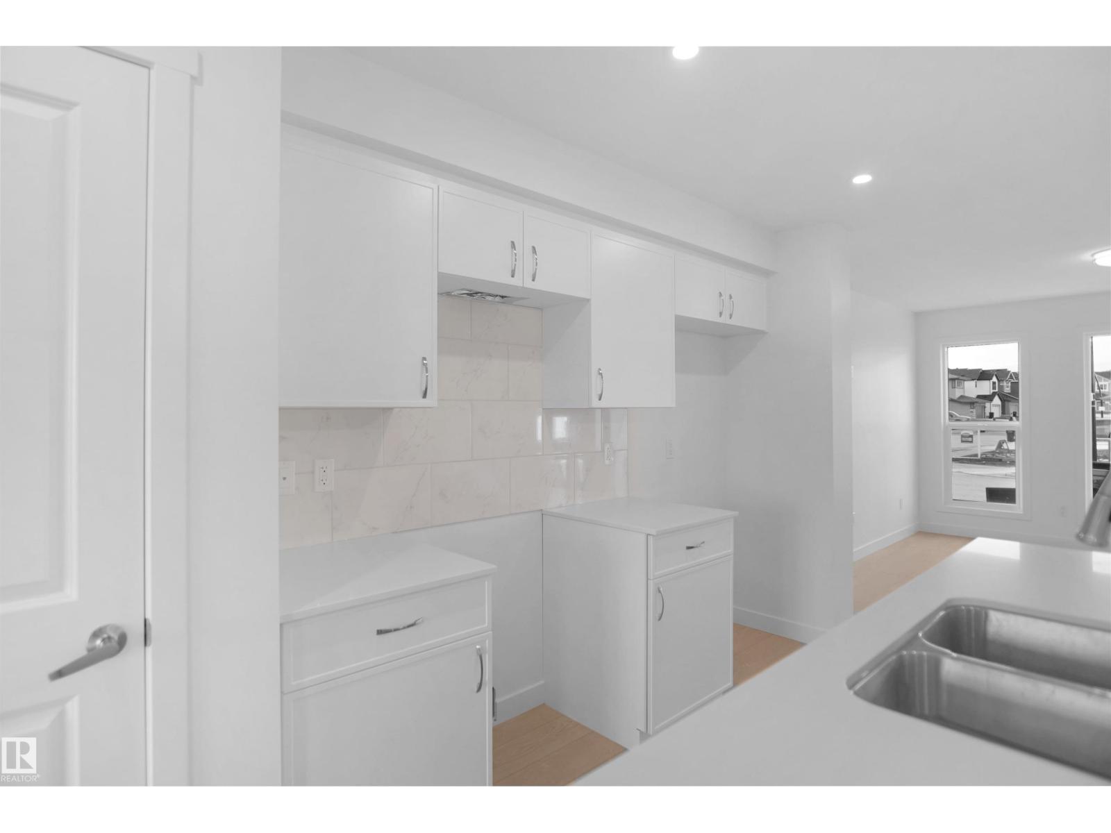 21035 25 AV NW - 11
