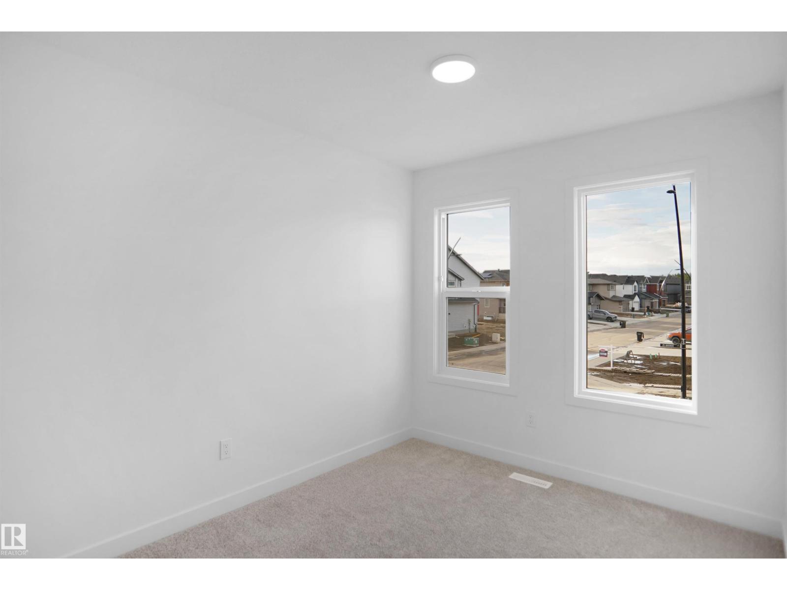 21035 25 AV NW - 22