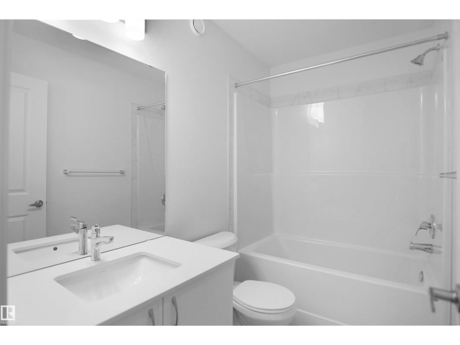 21035 25 AV NW - 26