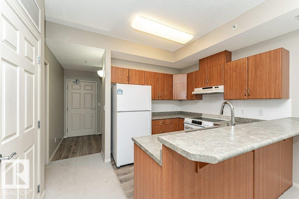 #302 11103 84 AV NW - 12