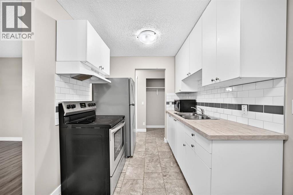 #1 11415 8 Street SW - 4