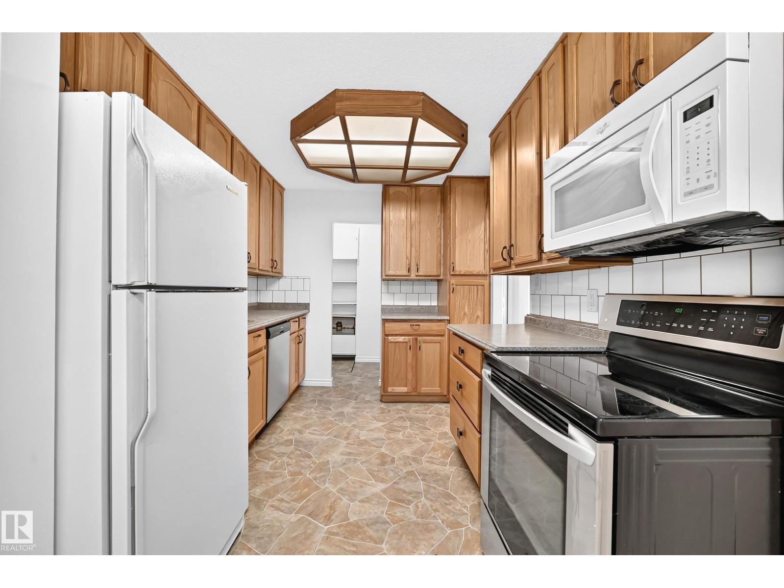 #40 3111 142 AV NW - 5