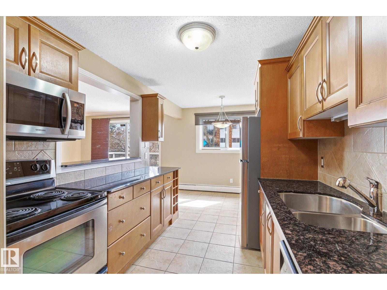 #204 10720 84 AV NW - 12