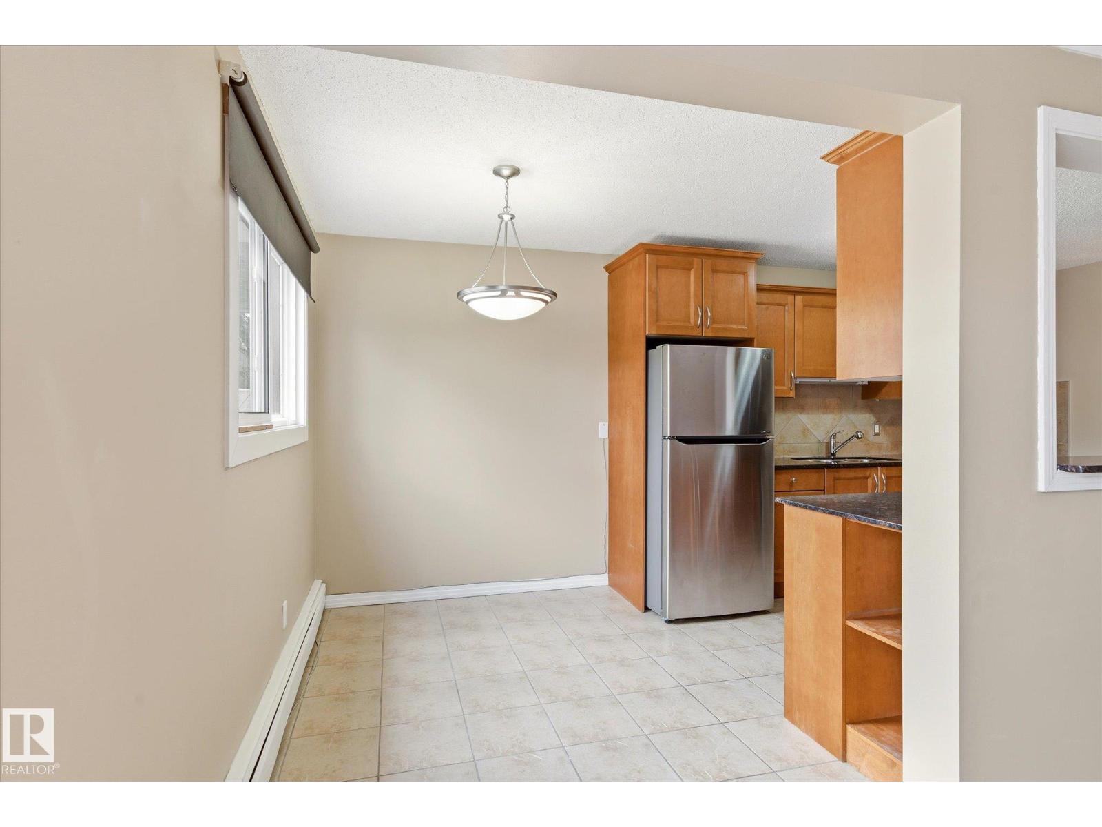 #204 10720 84 AV NW - 8