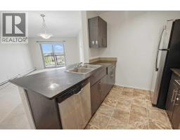 Bedroom - 409, 15 Saddlestone Way Ne, Calgary, AB T3J0S3 Photo 7