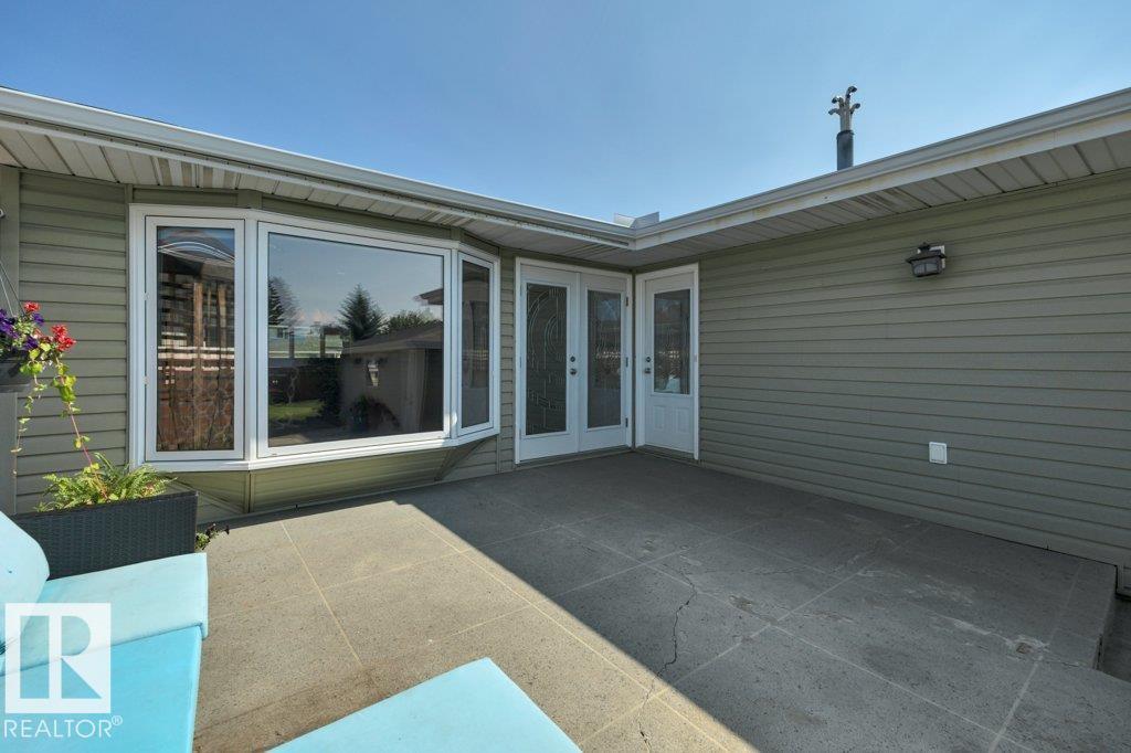 6960 21 AV NW - 56