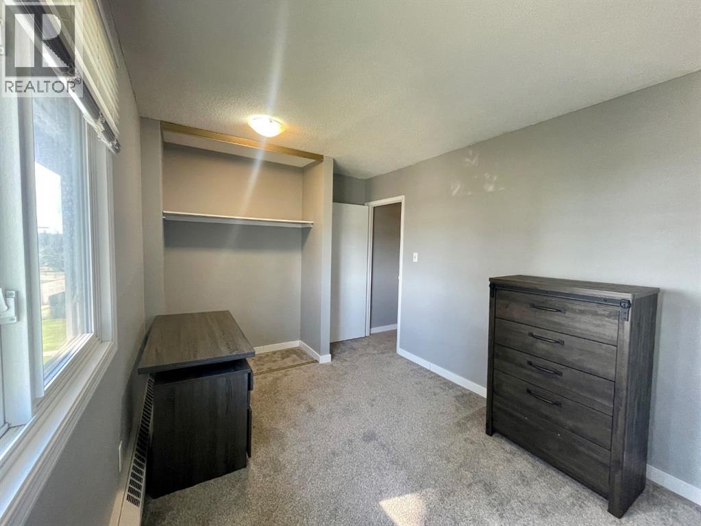 #306B 5611 9 Avenue - 23