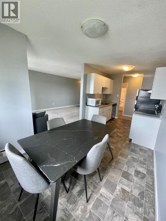 #306B 5611 9 Avenue - 5