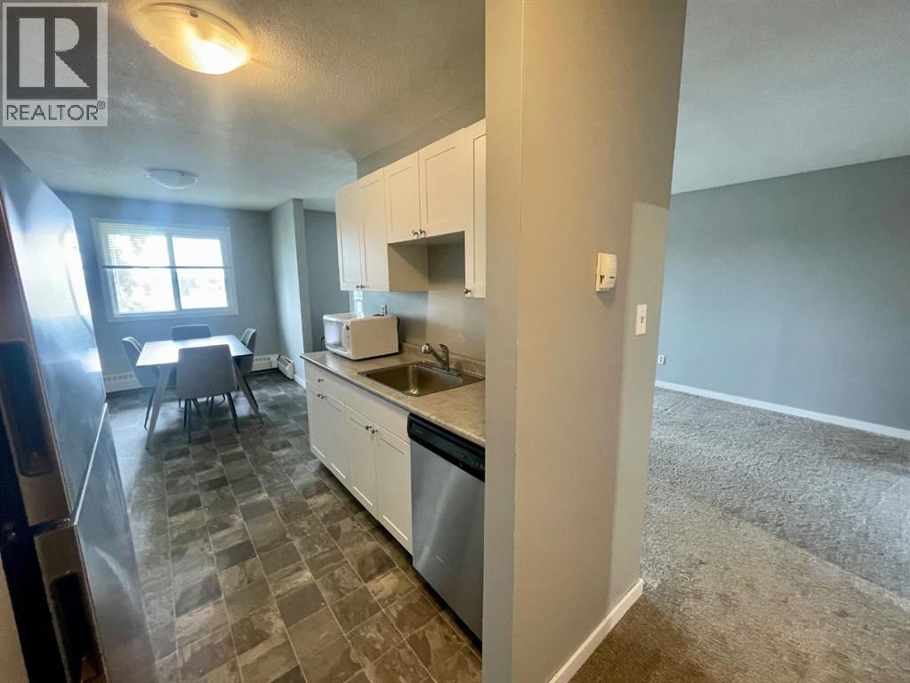 #306B 5611 9 Avenue - 8
