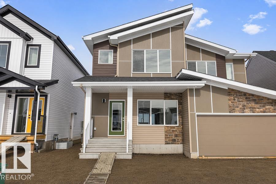 604 176 AV NE - 1