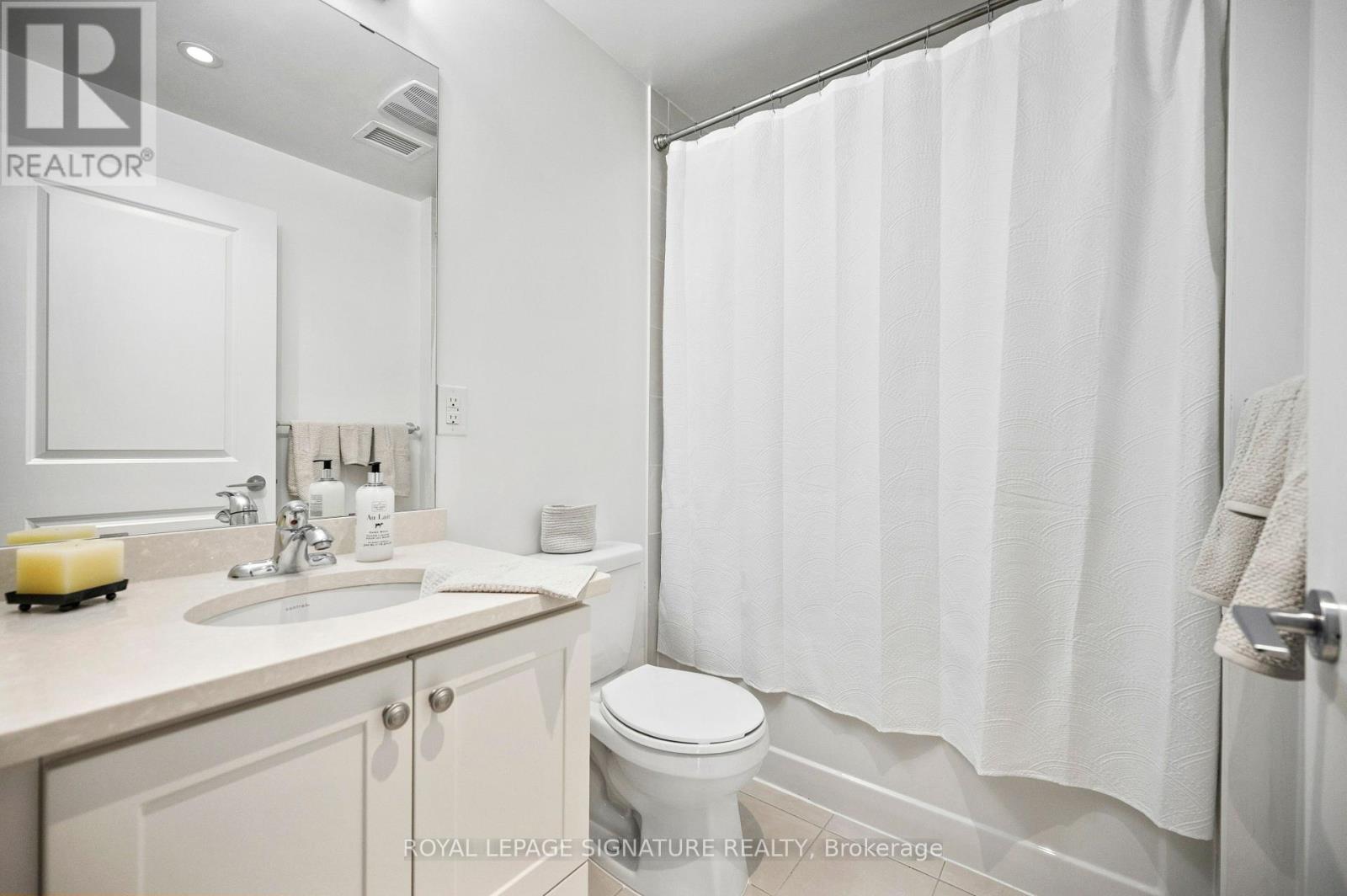 #303 3563 LAKE SHORE BOULEVARD W - Image 32