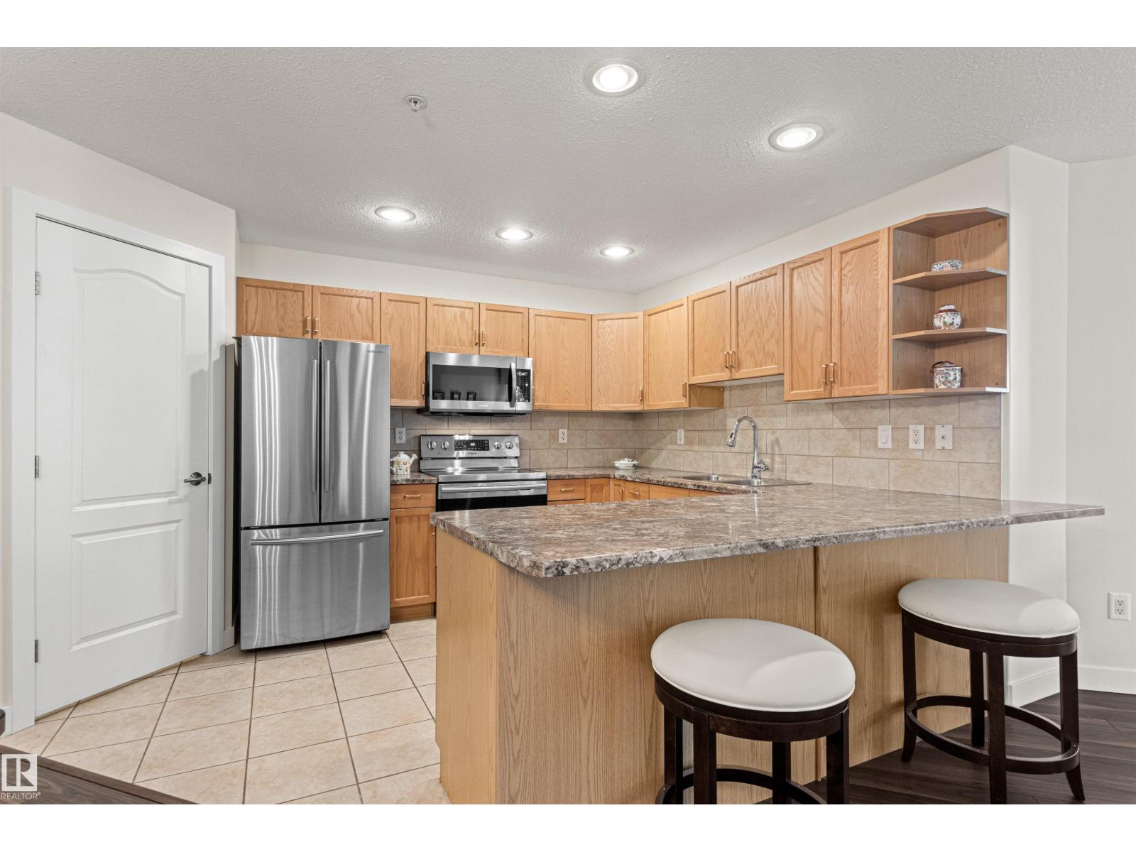 #203 8956 156 ST NW - 11