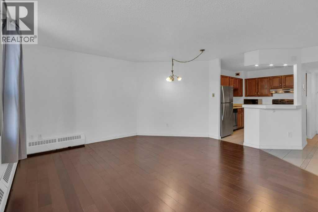 #402 1202 13 Avenue SW - 13