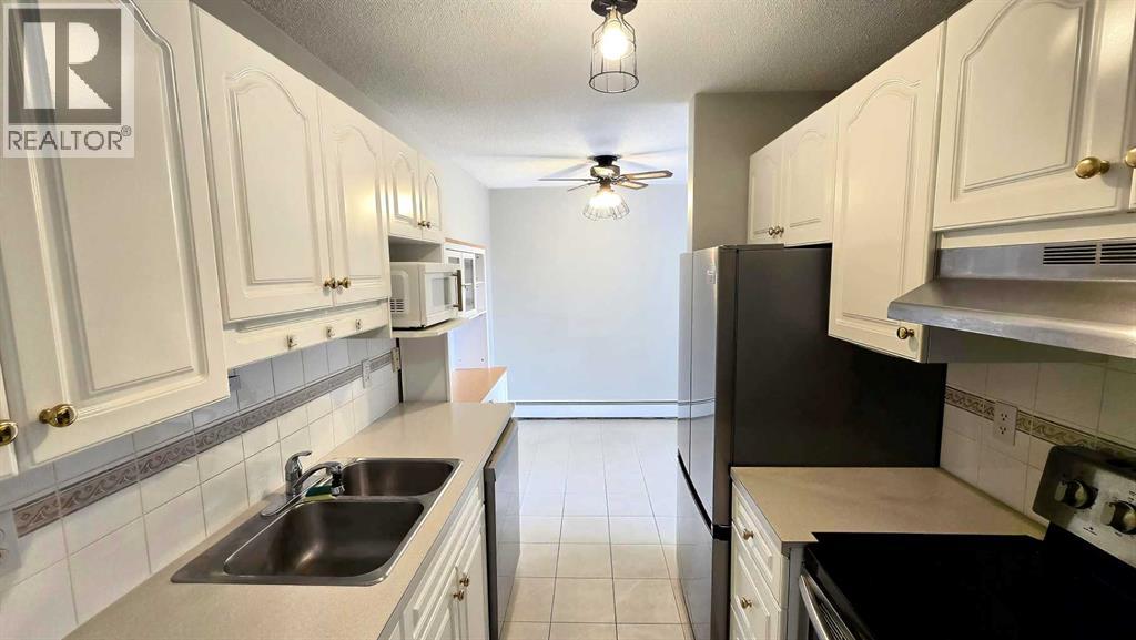 #112 315 Heritage Drive SE - 3