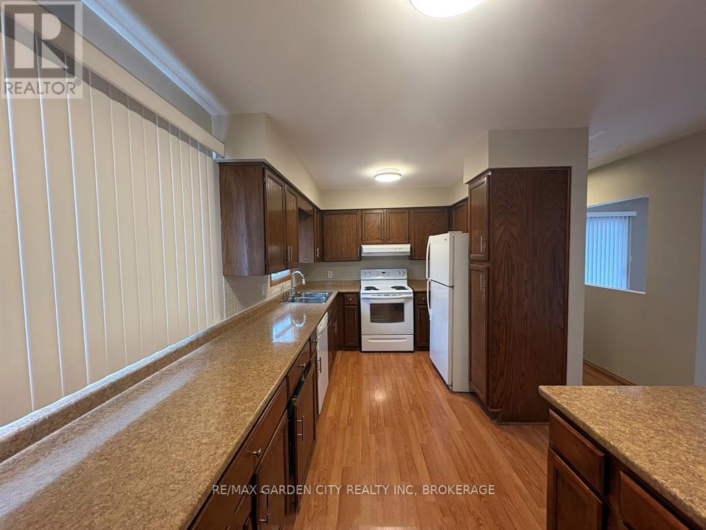 6141 WILDROSE CRESCENT - 6