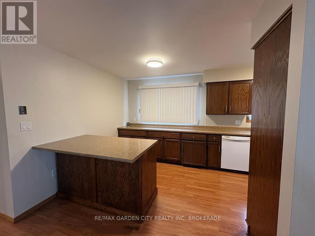 6141 WILDROSE CRESCENT - 7